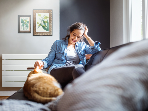 cat and women in living room 
